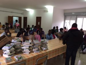 Preparing to share the Bible's and shoes to the refugees in Salaparuta